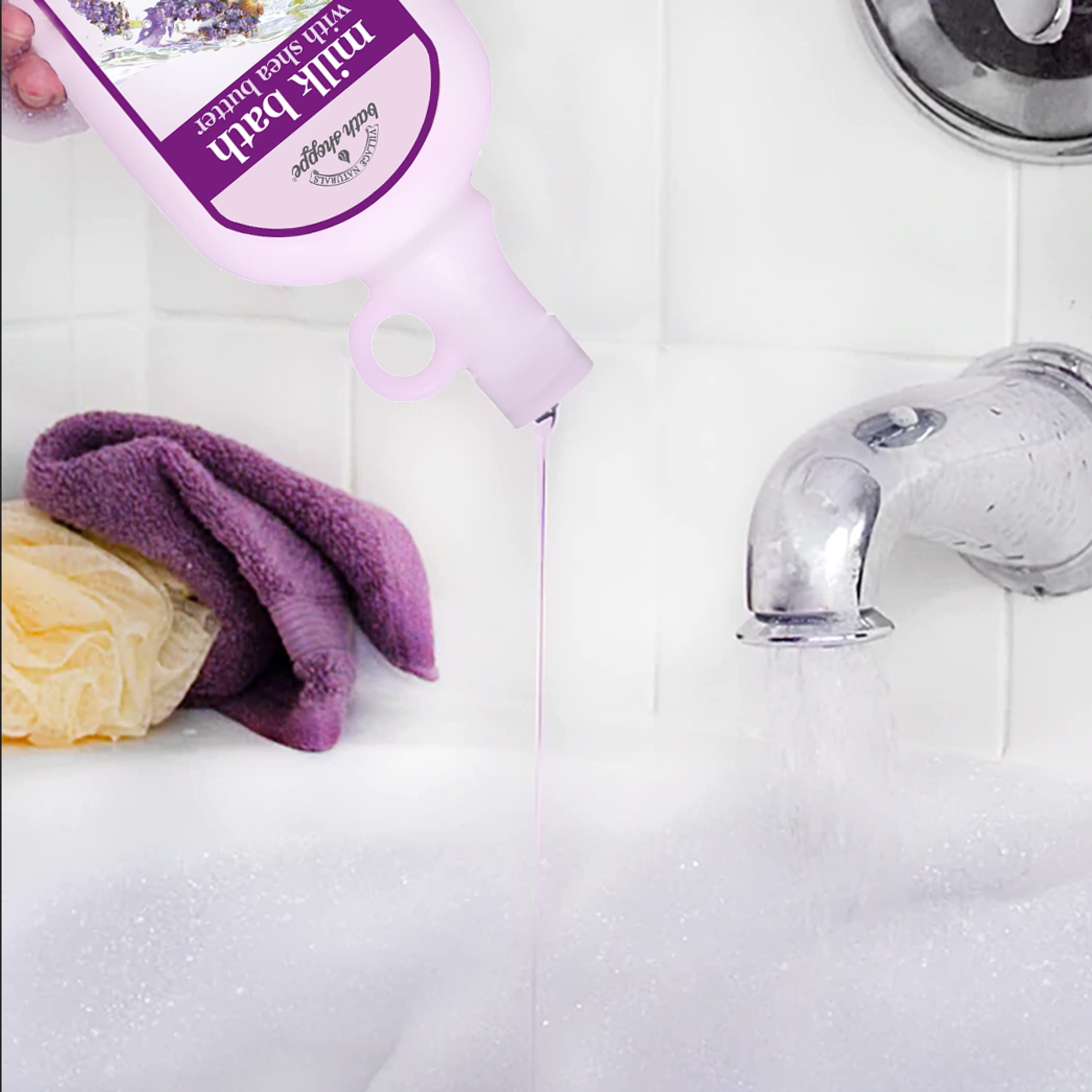 Village Naturals Bath Shoppe milk bath pour demonstrates rich bubbles and fragrance