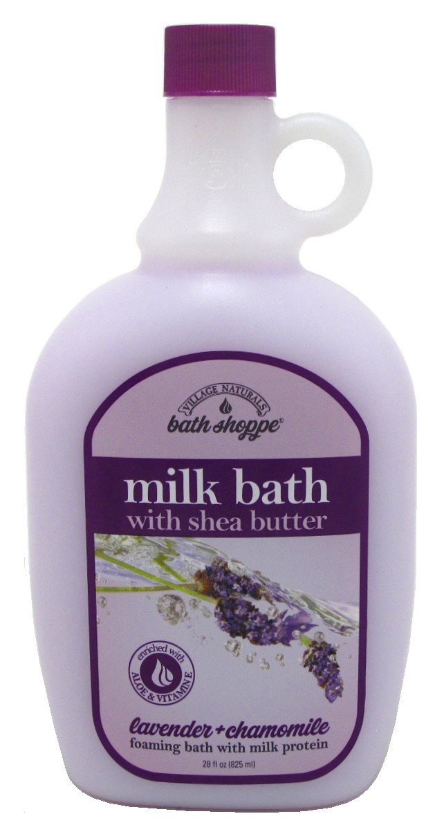 Village Naturals Therapy bath milk bottle closeup highlights shea butter and vitamin E