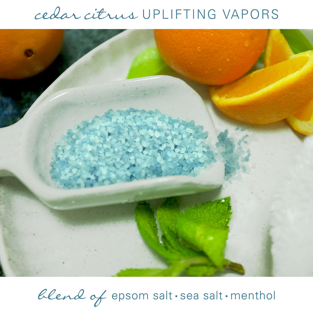 Village Naturals Therapy tension bath soak Cedar Citrus in a steaming tub for relaxation