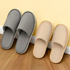Vipay M-size beige disposable slippers shown for indoor guest comfort.