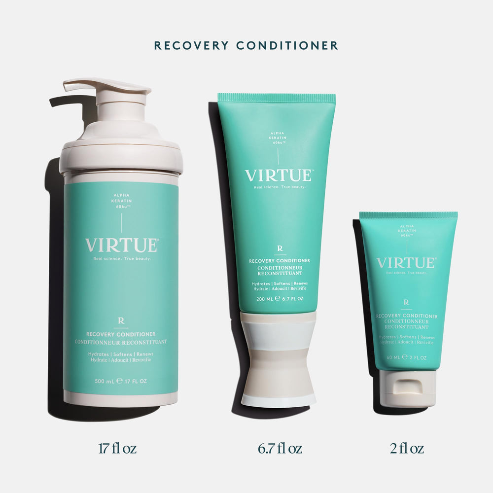 Hair being rinsed with VIRTUE Recovery Conditioner for a glossy finish.