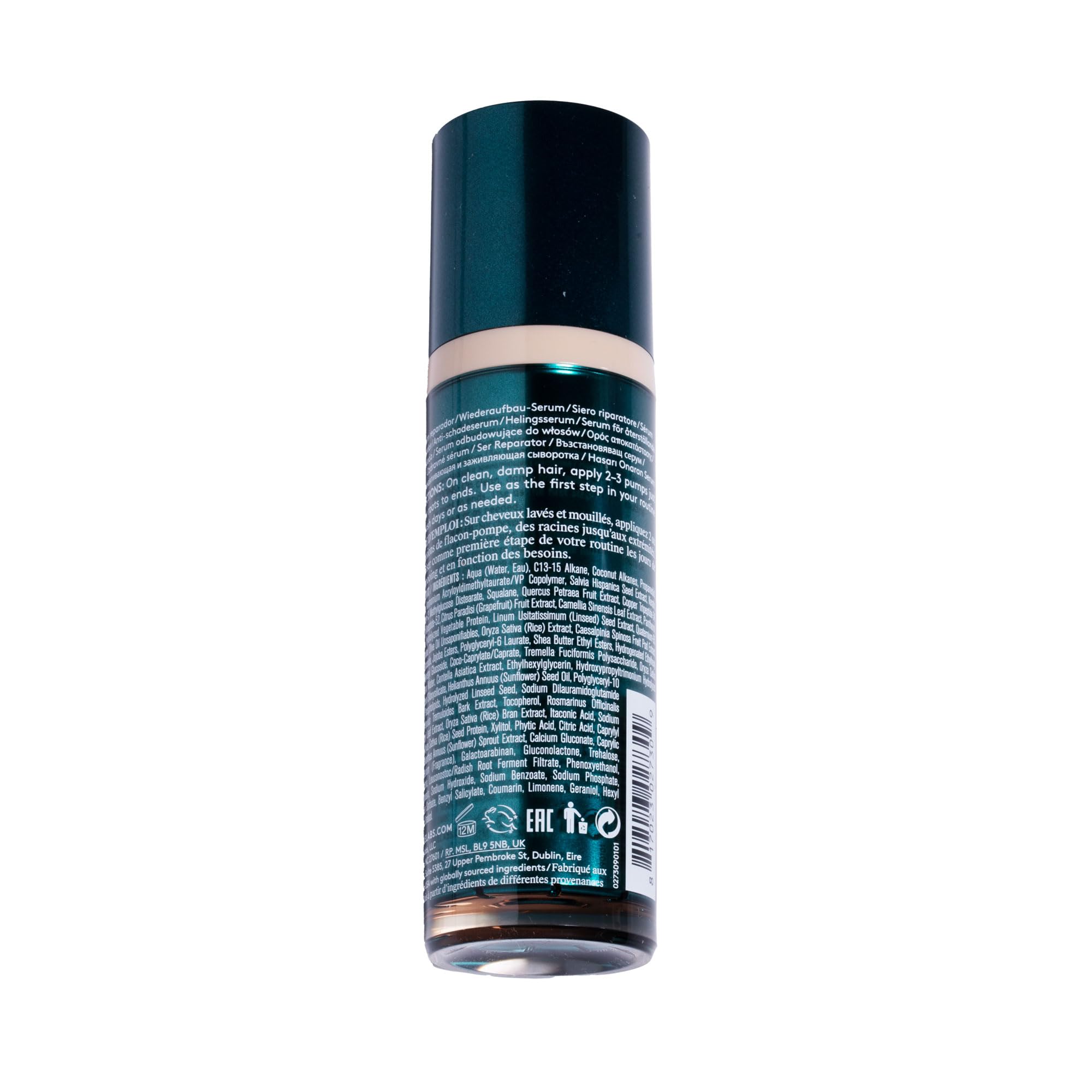 VIRTUE Recovery Damage Reverse Hair Serum close-up on bottle highlighting smooth texture.