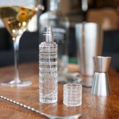 Viski martini atomizer with plastic lid designed for secure travel and spill-free spraying.