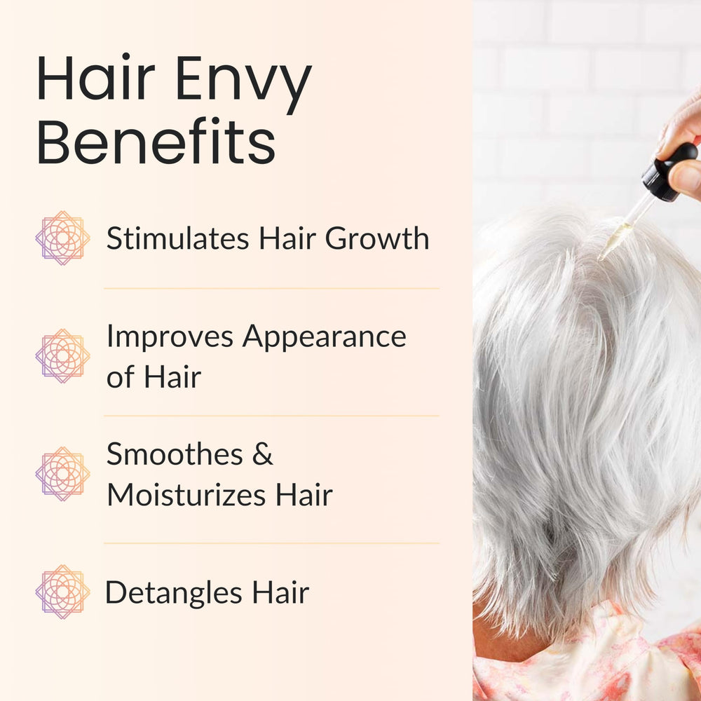 Vitality Hair Envy ingredients close-up featuring avocado, castor, rosemary