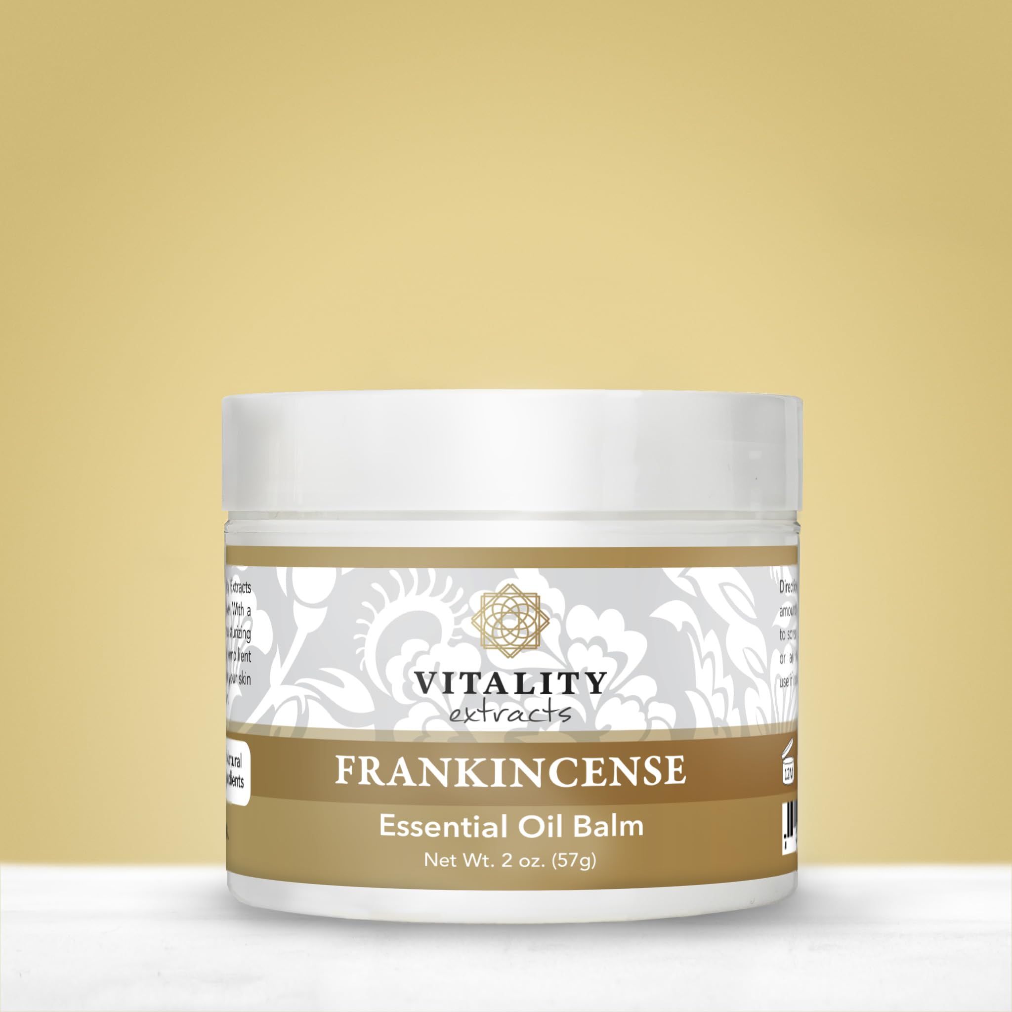 Creamy texture of Vitality Frankincense Balm ready for application.