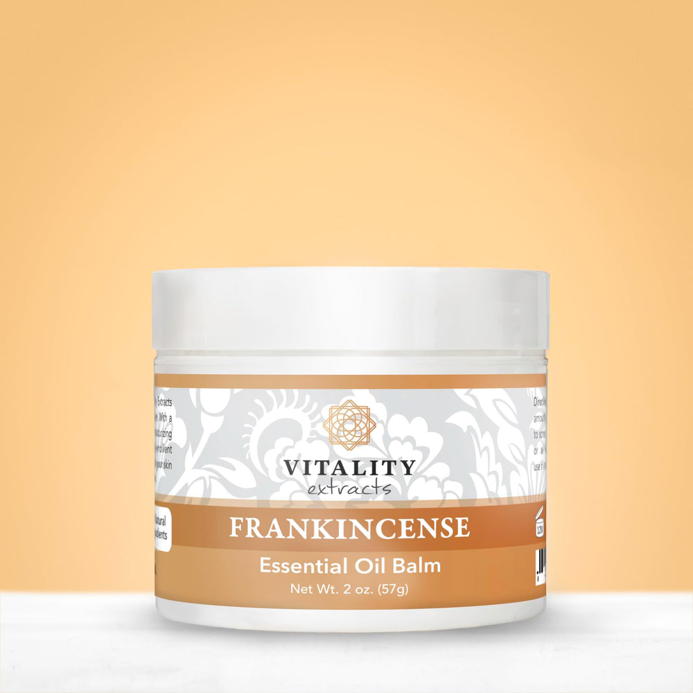 Creamy texture of Vitality Frankincense Balm ready for application.