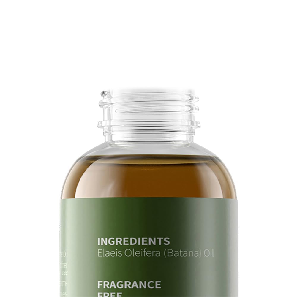 Vivccon Batana Oil on dry hair to protect and moisturize.