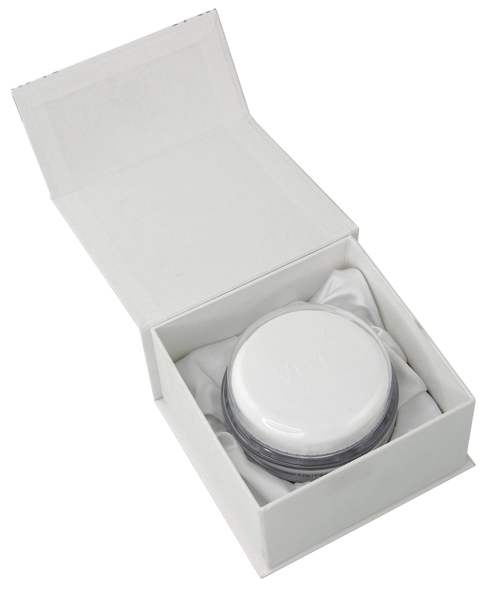 Vivo Per Lei model beside cream implies refreshed skin after use.