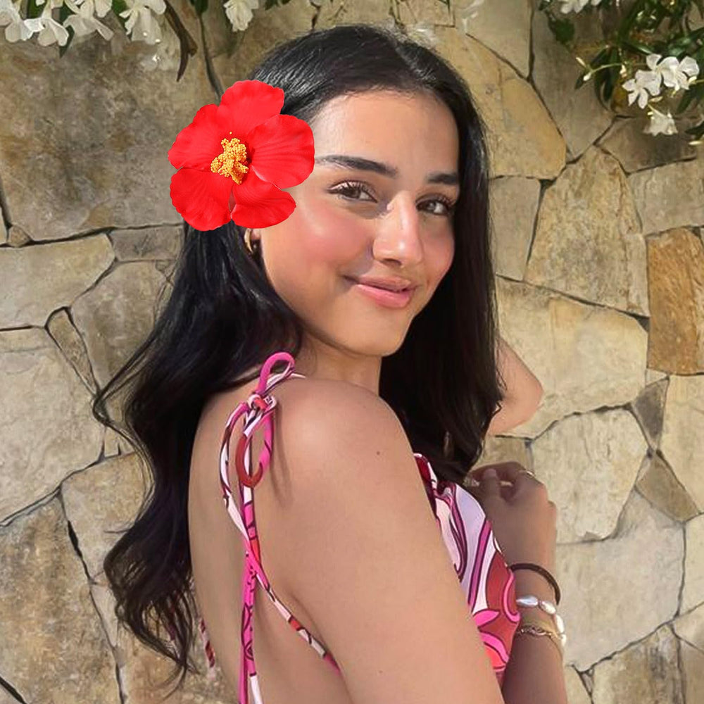 VOBOBE Hawaiian flower clip orange offers warm vibrancy for summer looks.