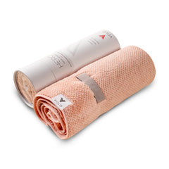 VOLO Hero Cloud Pink towel with snug strap in-use, no slipping.