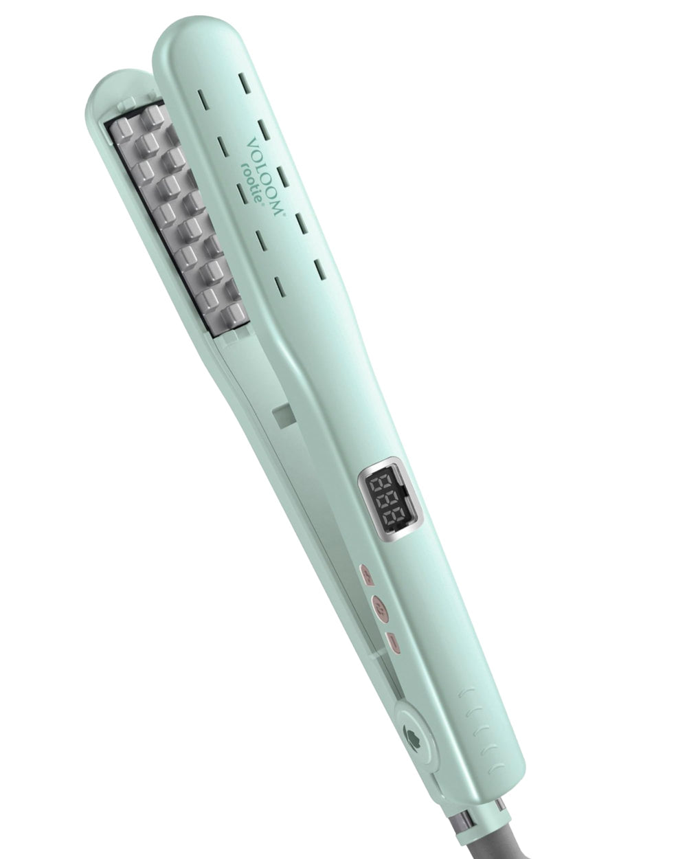 VOLOOM Rootie plate closeup demonstrates the ceramic surface for precise volumizing at the roots.
