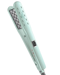VOLOOM Rootie plate closeup demonstrates the ceramic surface for precise volumizing at the roots.