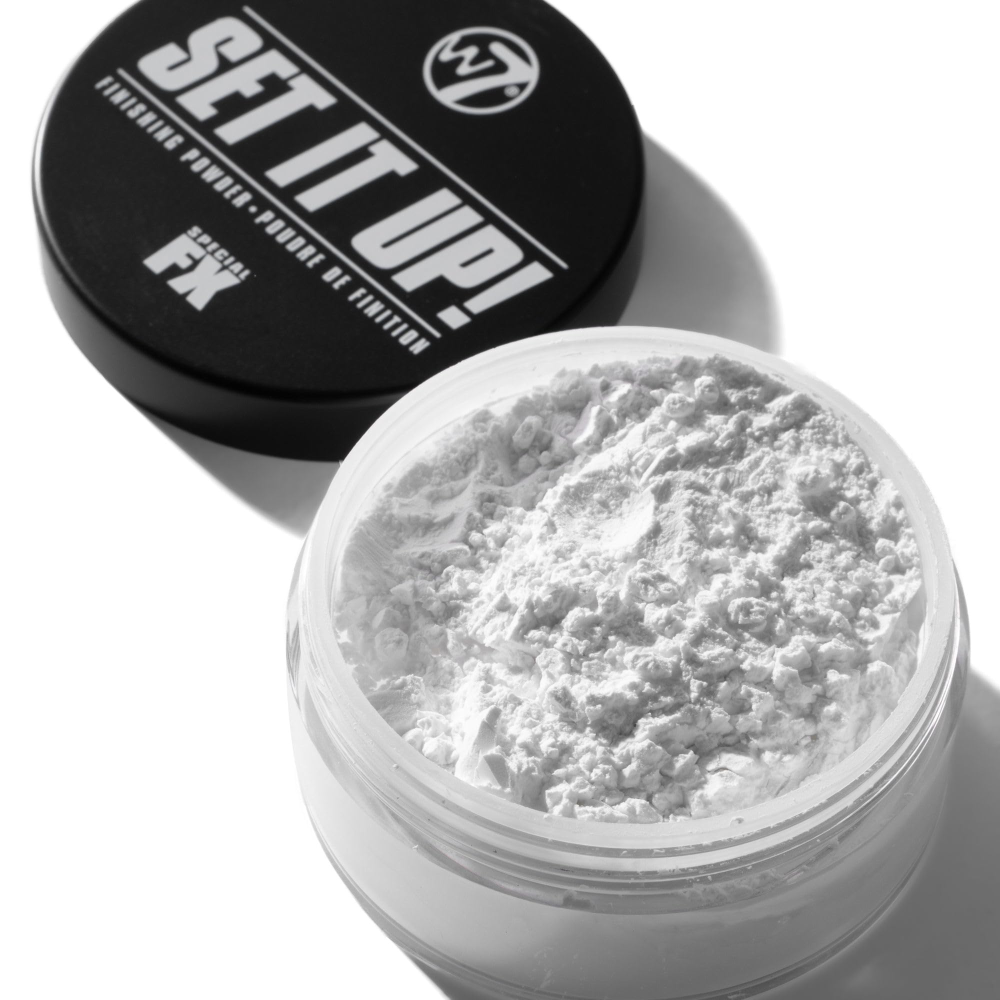 W7 Set It Up translucent powder blurred effect on skin for shine reduction.