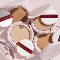 Wander Beauty Wanderlust Powder Foundation Medium brush-application demonstrating buildable coverage