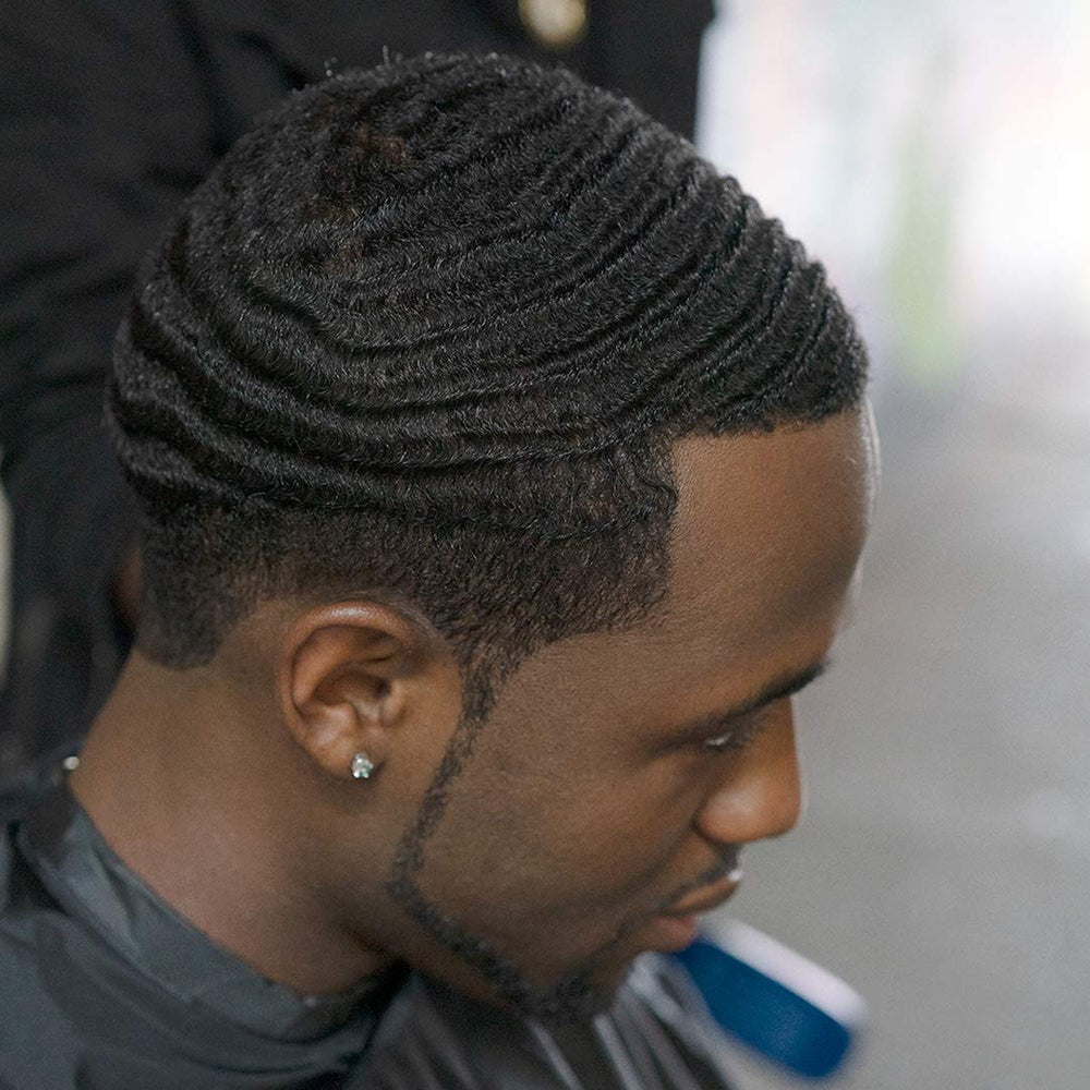 WaveBuilder Cocoa & Shea Pomade after-application brush to set wave shape