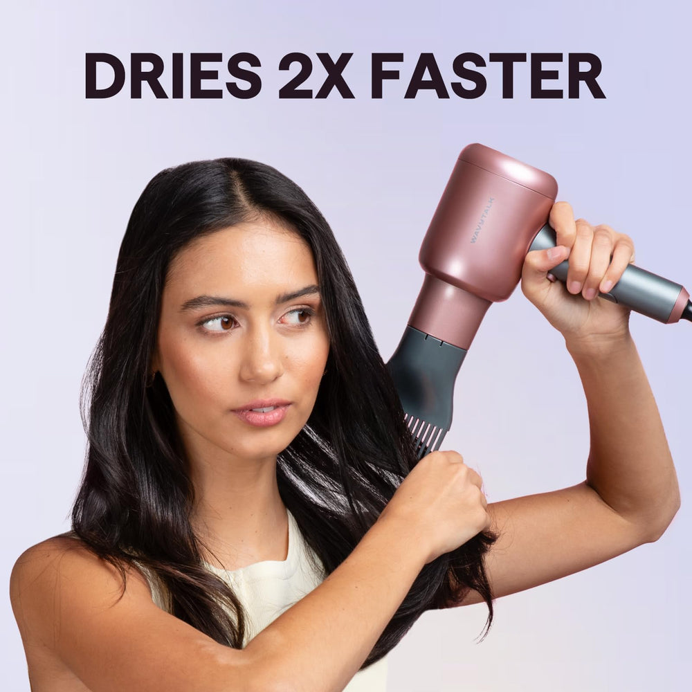 Wavytalk comb attachment in pink smoothing and straightening thick hair.