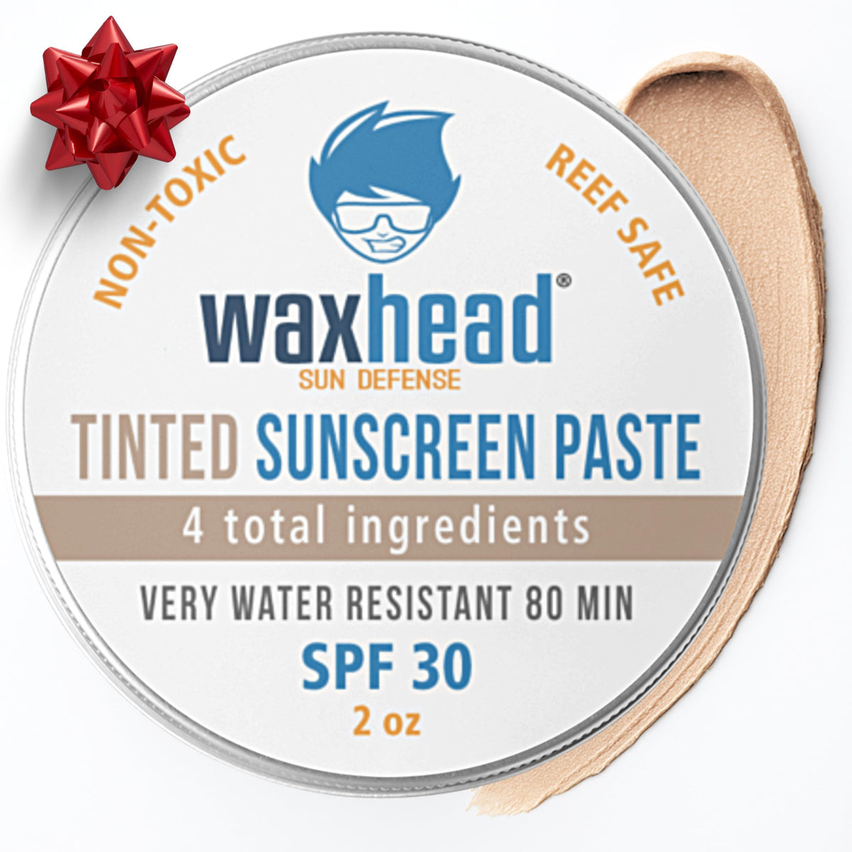 Waxhead tinted zinc oxide sunscreen tin ready for travel and reef-safe beach days