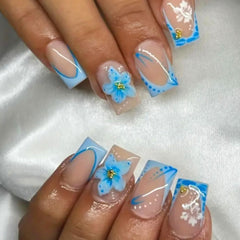 WBRRFJJ blue flower press-on nails 24pcs provide fast at-home manicures.