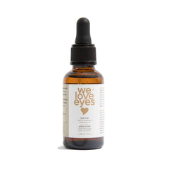 We Love Eyes eyelid cleansing oil bottle with tea tree for allergen removal and refreshed eyelids.