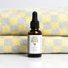 We Love Eyes natural tea tree eyelid cleansing oil close-up for gentle eye hygiene.
