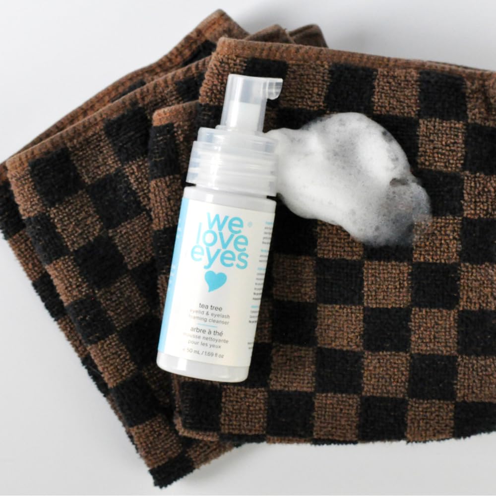 We Love Eyes tea tree eyelid cleanser close-up highlights natural ingredients and gentle lather