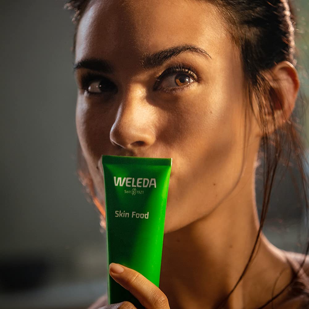 Weleda Skin Food Small 1oz Cream applied to dry patches on elbows or heels for relief.