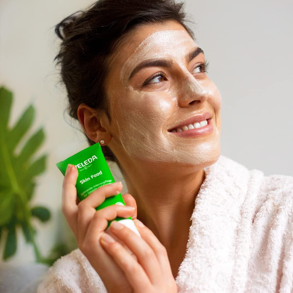 Weleda Skin Food Small 1oz Cream jar open showing rich texture for deep hydration.