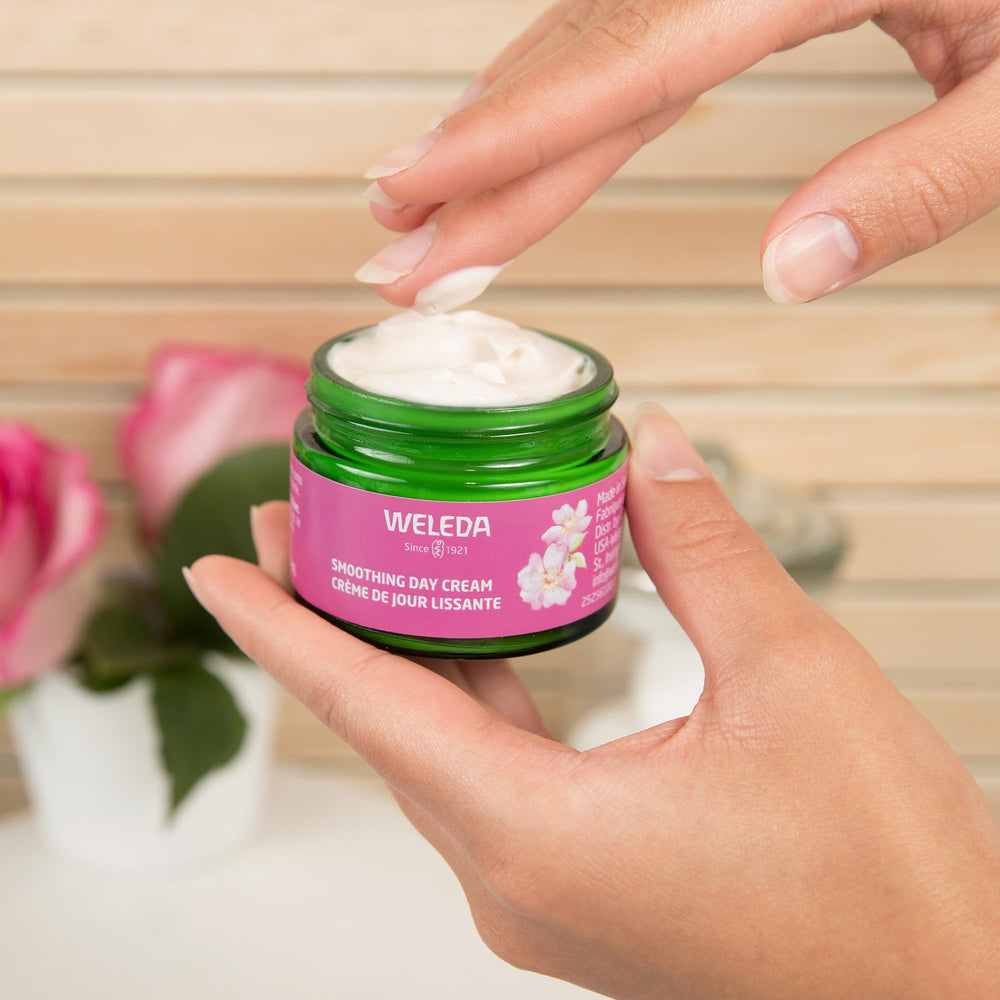 Weleda Smoothing Day Cream bottle on bathroom counter for a daily ritual.