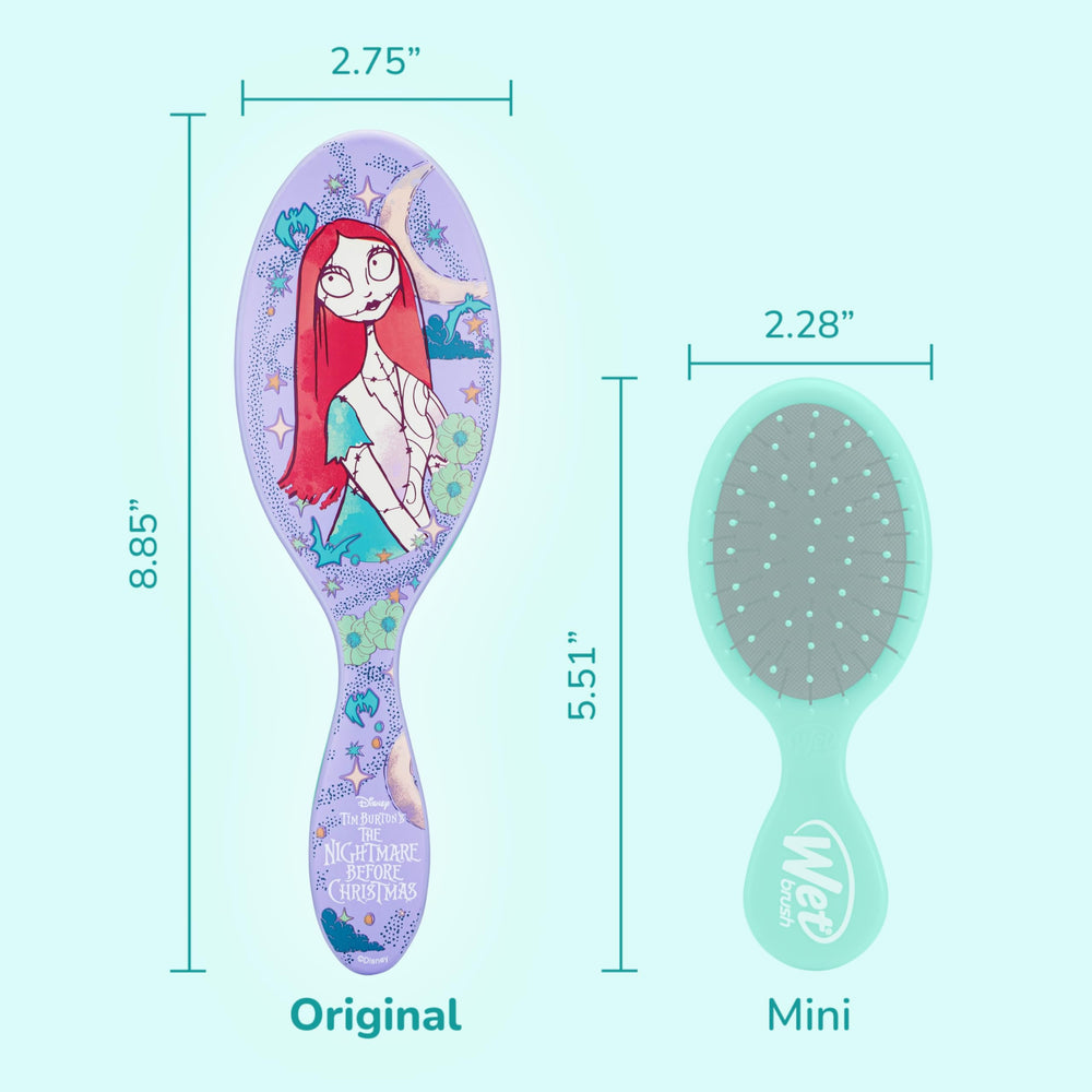 Wet Brush detangling dry hair with flexible bristles to reduce snagging.