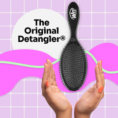 Wet Brush detangles dry hair with a painless, snag-free brushing motion.