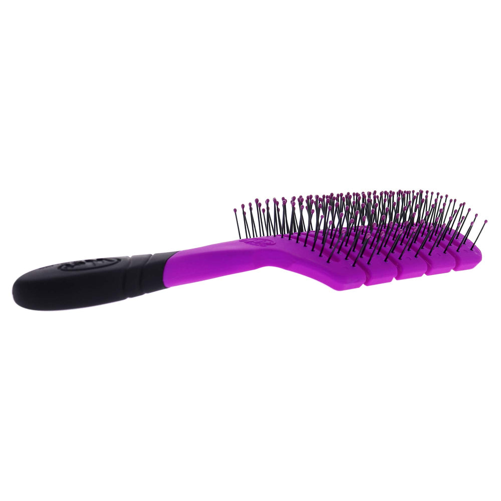 Wet Brush Pro Flex Dry Paddle Brush handle view highlights a non-slip grip for wet hair.
