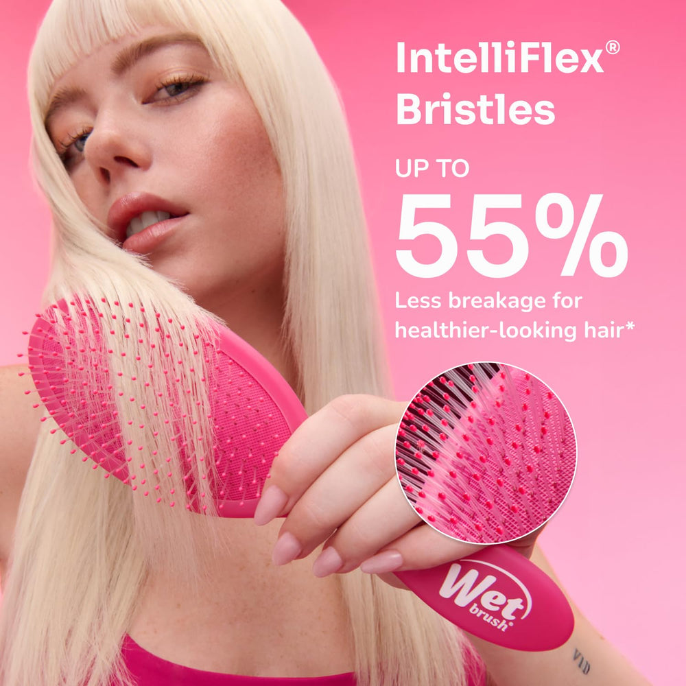 Wet Brush detangling curly hair demonstrating gentle glide without pulling