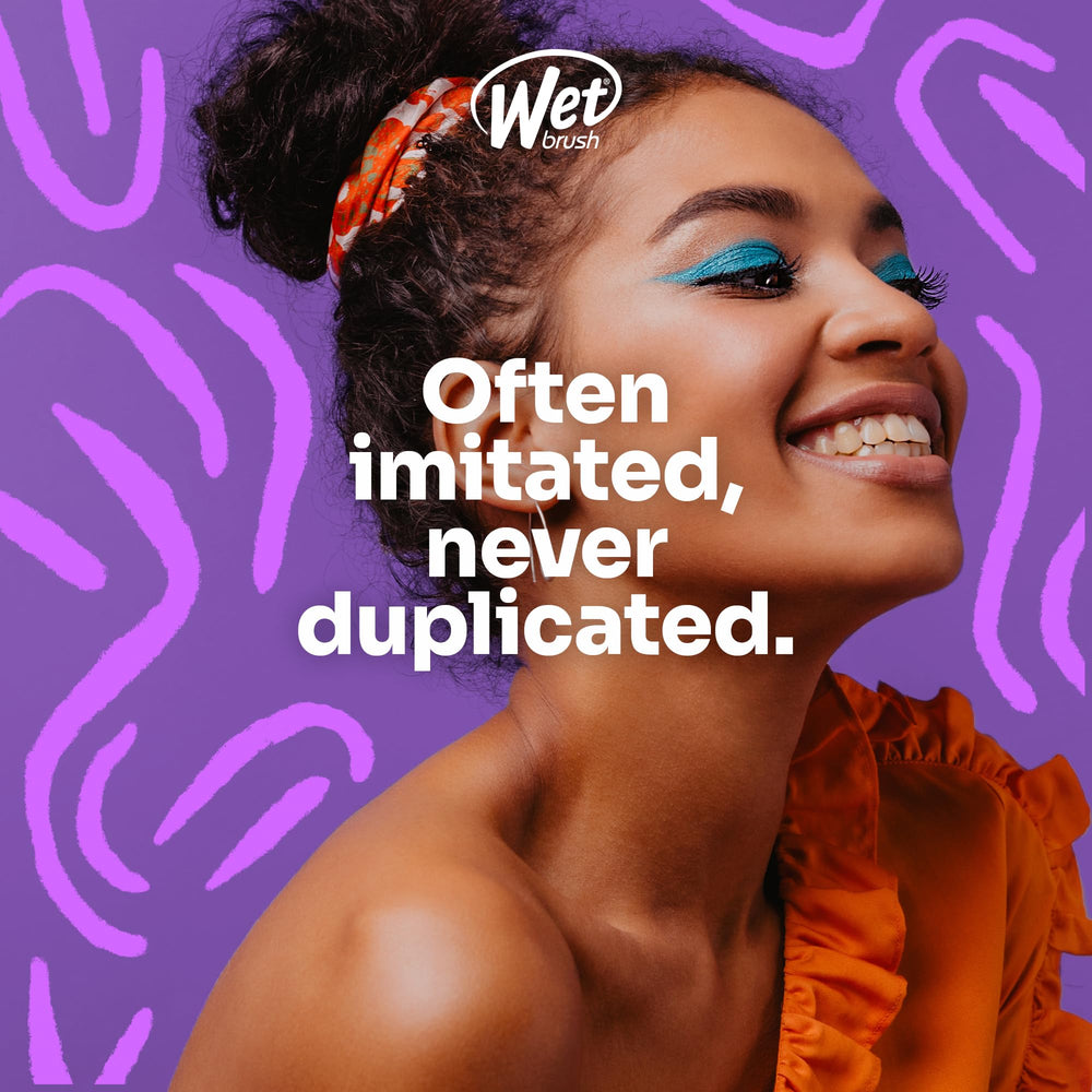 Wet Brush in use on wet hair for easy detangling during morning routine.