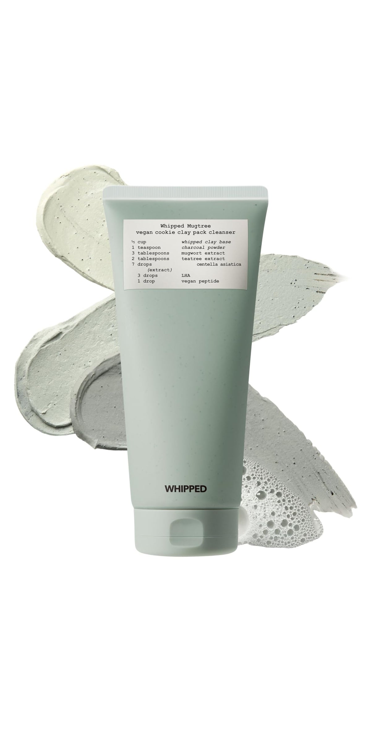 Whipped Semo charcoal clay face wash bottle closeup highlighting detoxifying cleanse for pores.