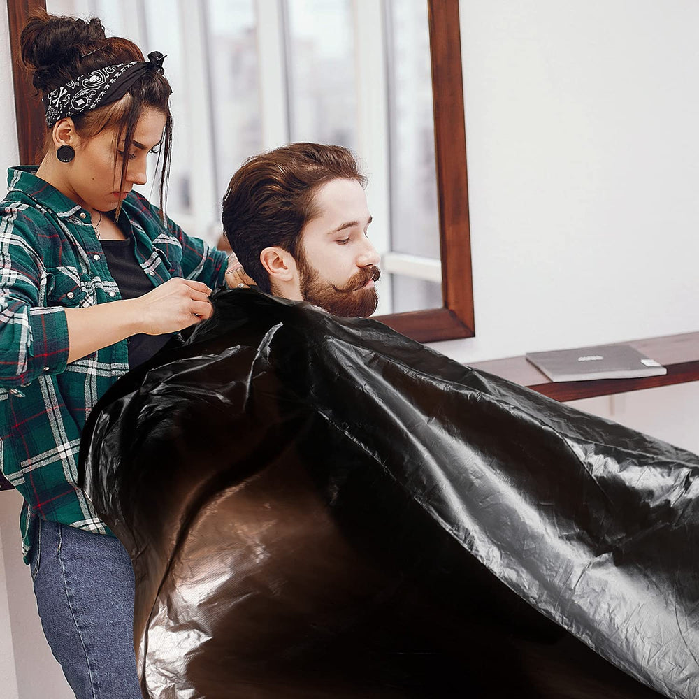 Willbond 100-piece disposable cape pack offers convenient single-use protection for clients.