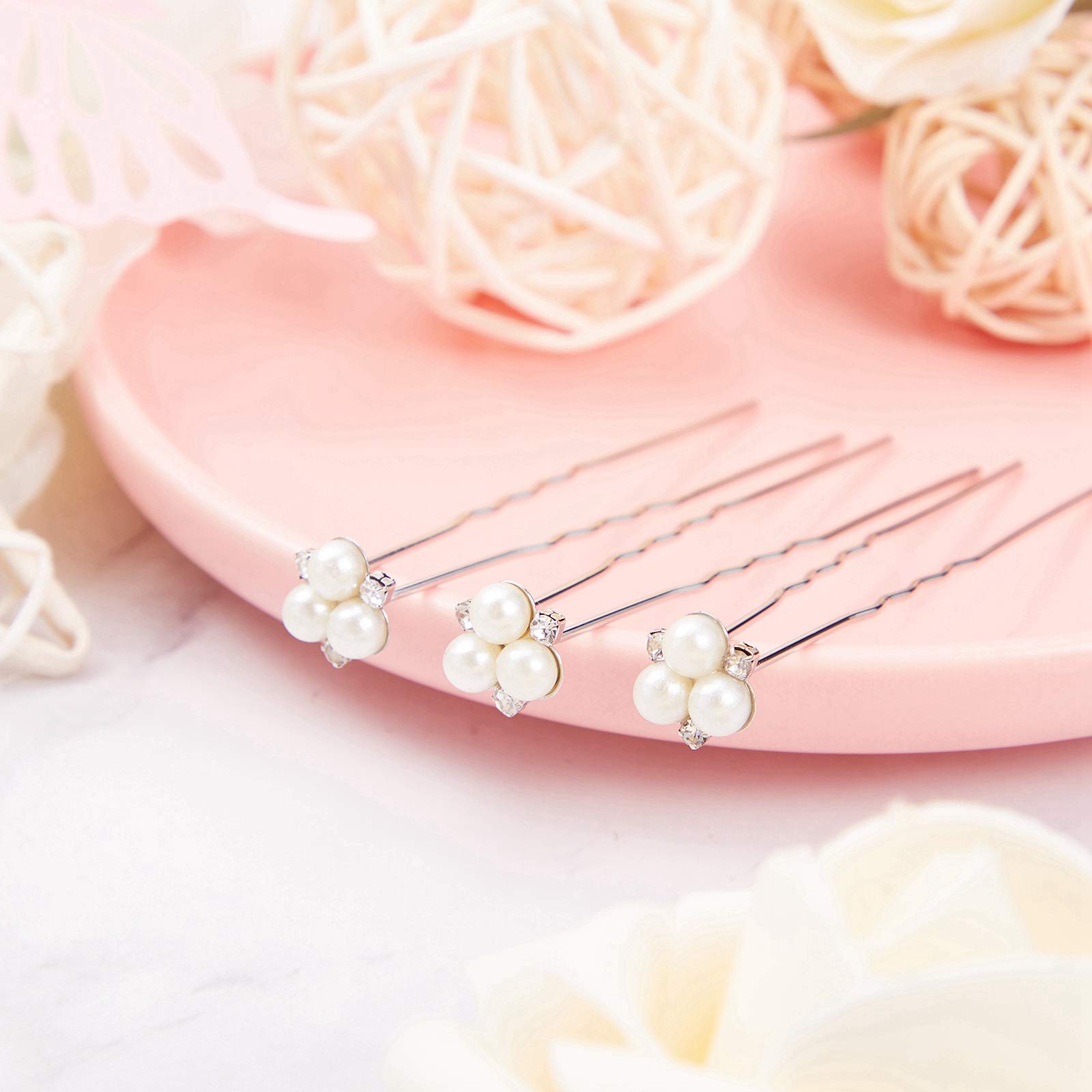 Willbond pearl hair pin-7 features three pearls and three rhinestones per pin.
