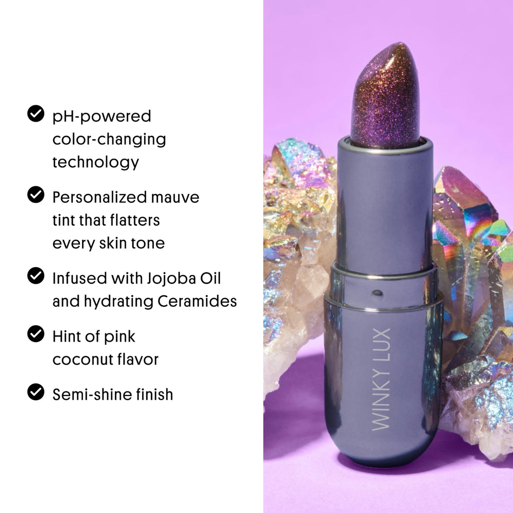 Winky Lux Aurora Glimmer Balm swatch on finger highlights subtle shimmer