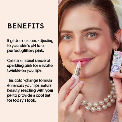 Winky Lux Balm pink-tint swirl on lips for sheer color.