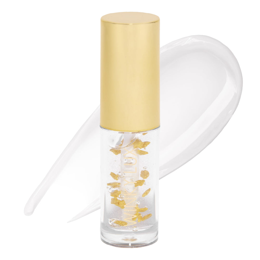 Winky Lux In The Stars Lip Oil swatch shows silky shine on lips