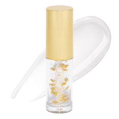 Winky Lux In The Stars Lip Oil swatch shows silky shine on lips