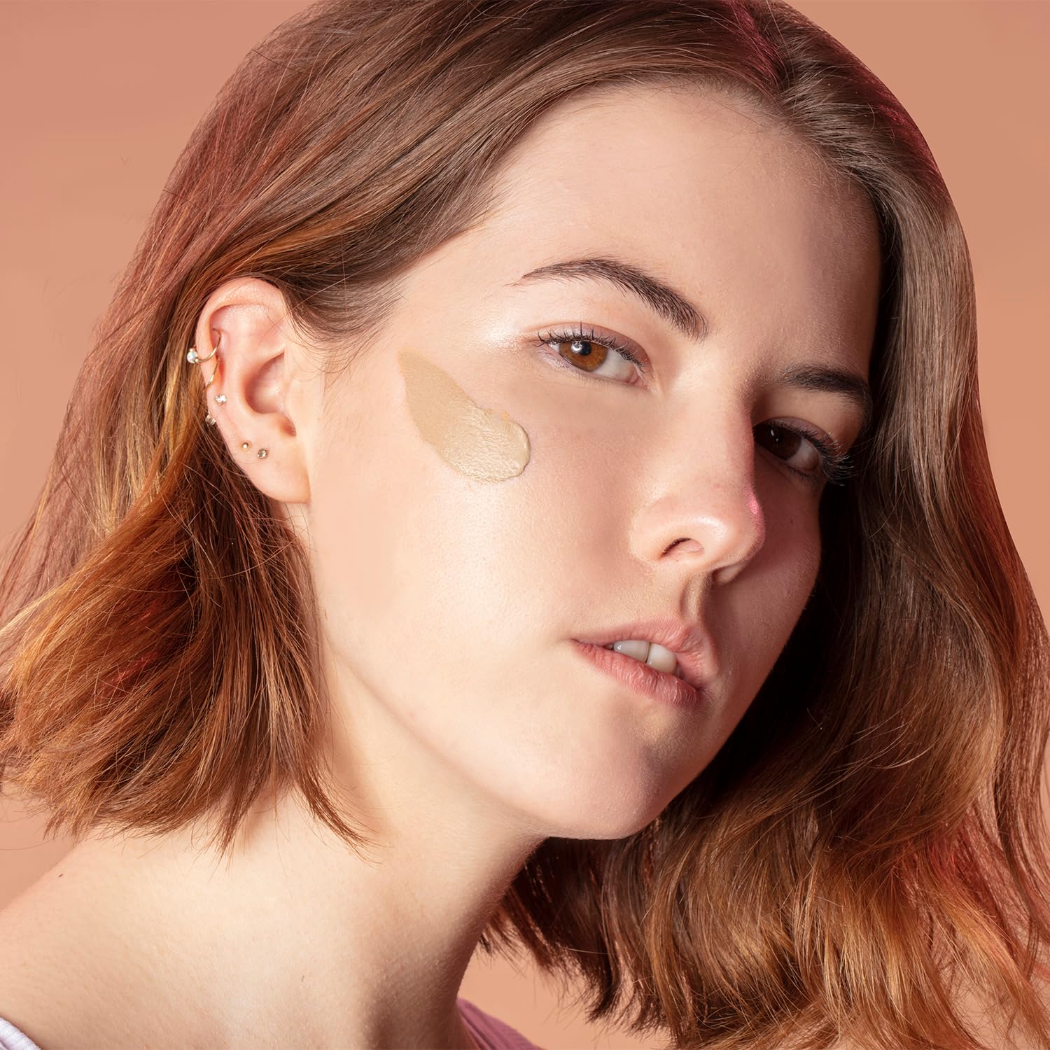 Winky Lux SPF cap close-up highlights SPF 30 protection for sun-ready skin