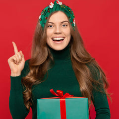 Winthrop headband knot-top detail enhances holiday hairstyle with subtle elegance