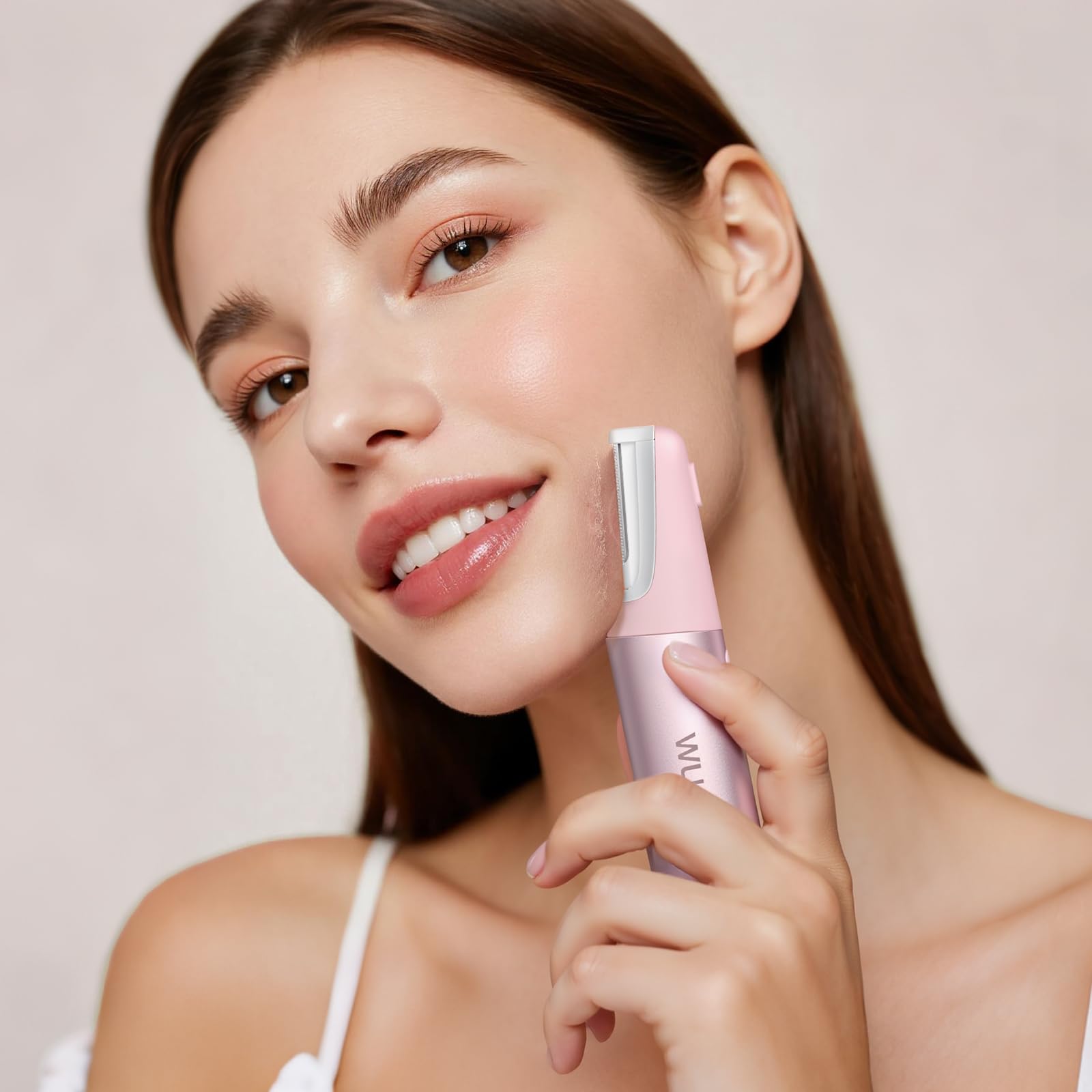 WLU Dermaplane Razor being used on cheek for peach fuzz removal.