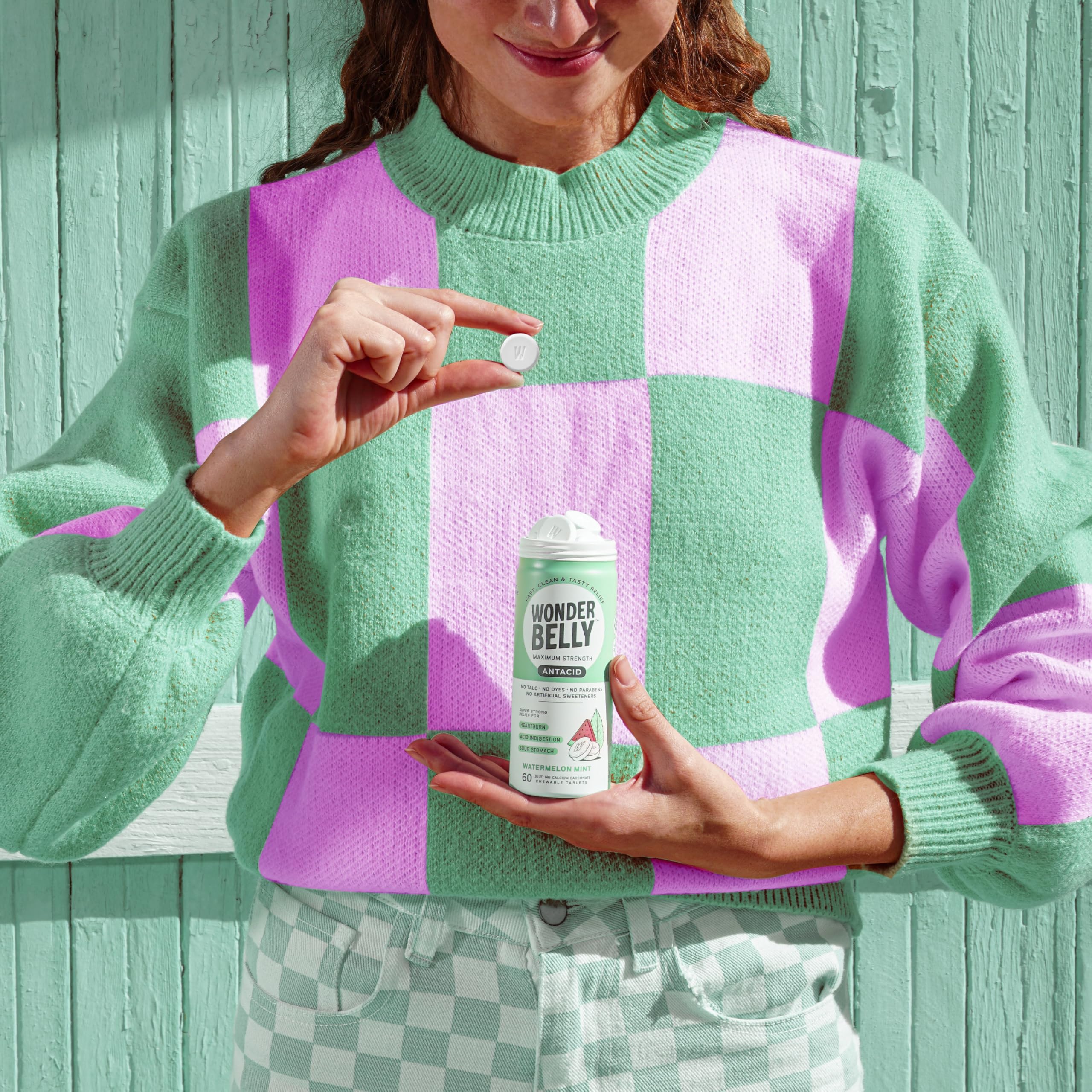 Wonderbelly antacid on desk or purse for travel-ready relief.