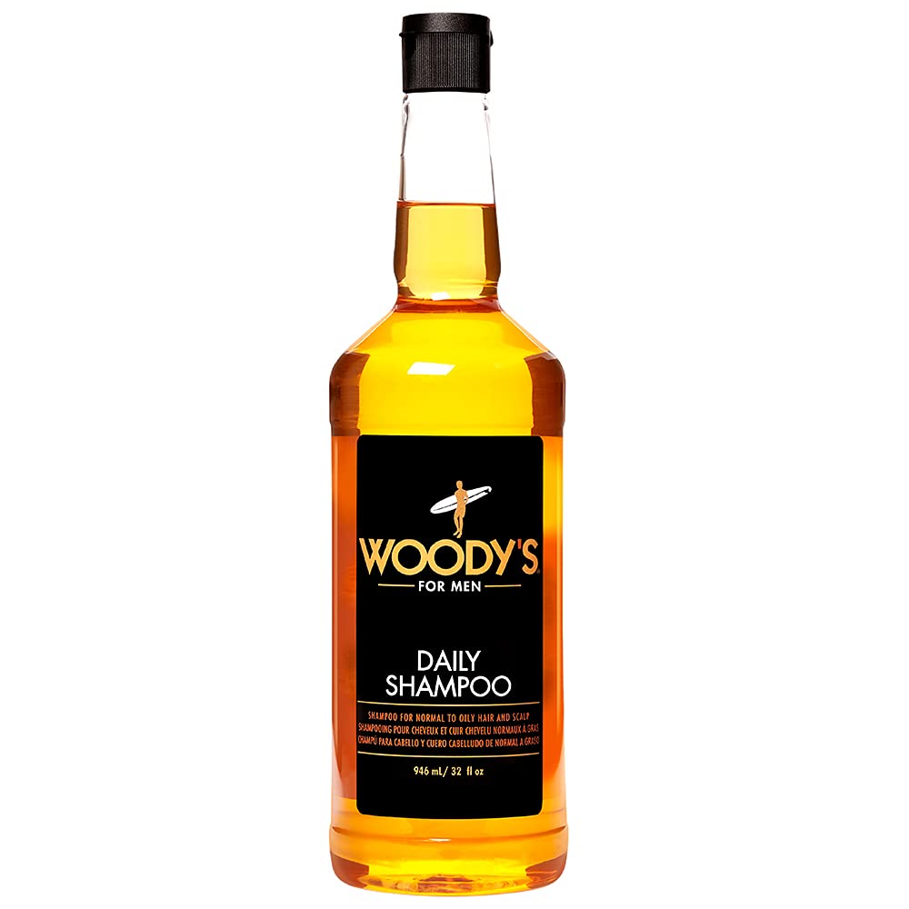 Woody's Daily Shampoo bottle pour shows a rich lather for daily scalp care.