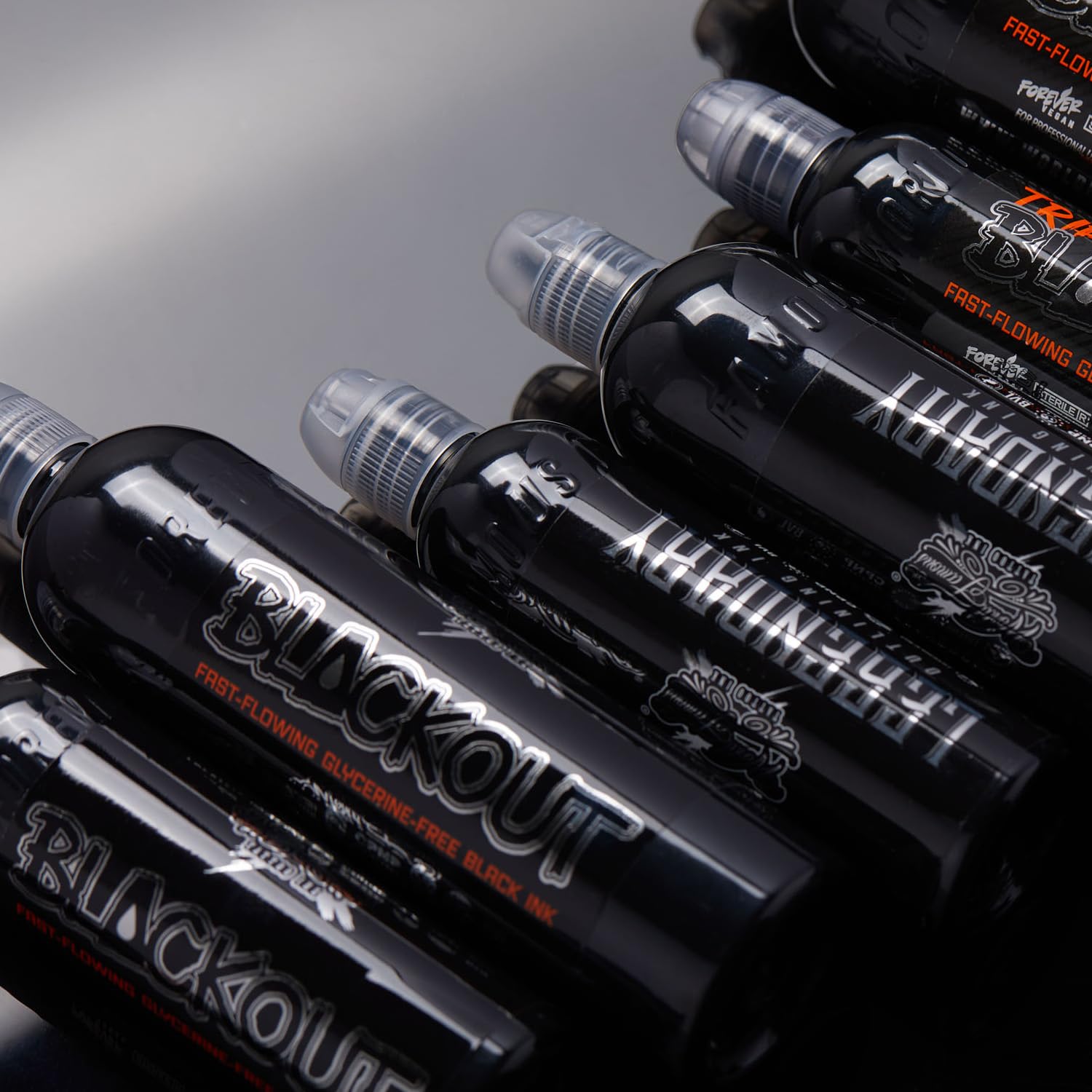 World Famous Tattoo Ink Blackout Crystal-Flex bottle with twist cap for hygienic studio use.