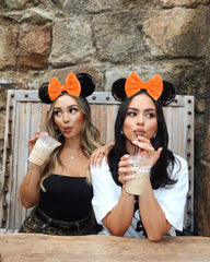WOVOWOVO orange bow sequin ears showcase sparkling detail for Halloween and theme park outings