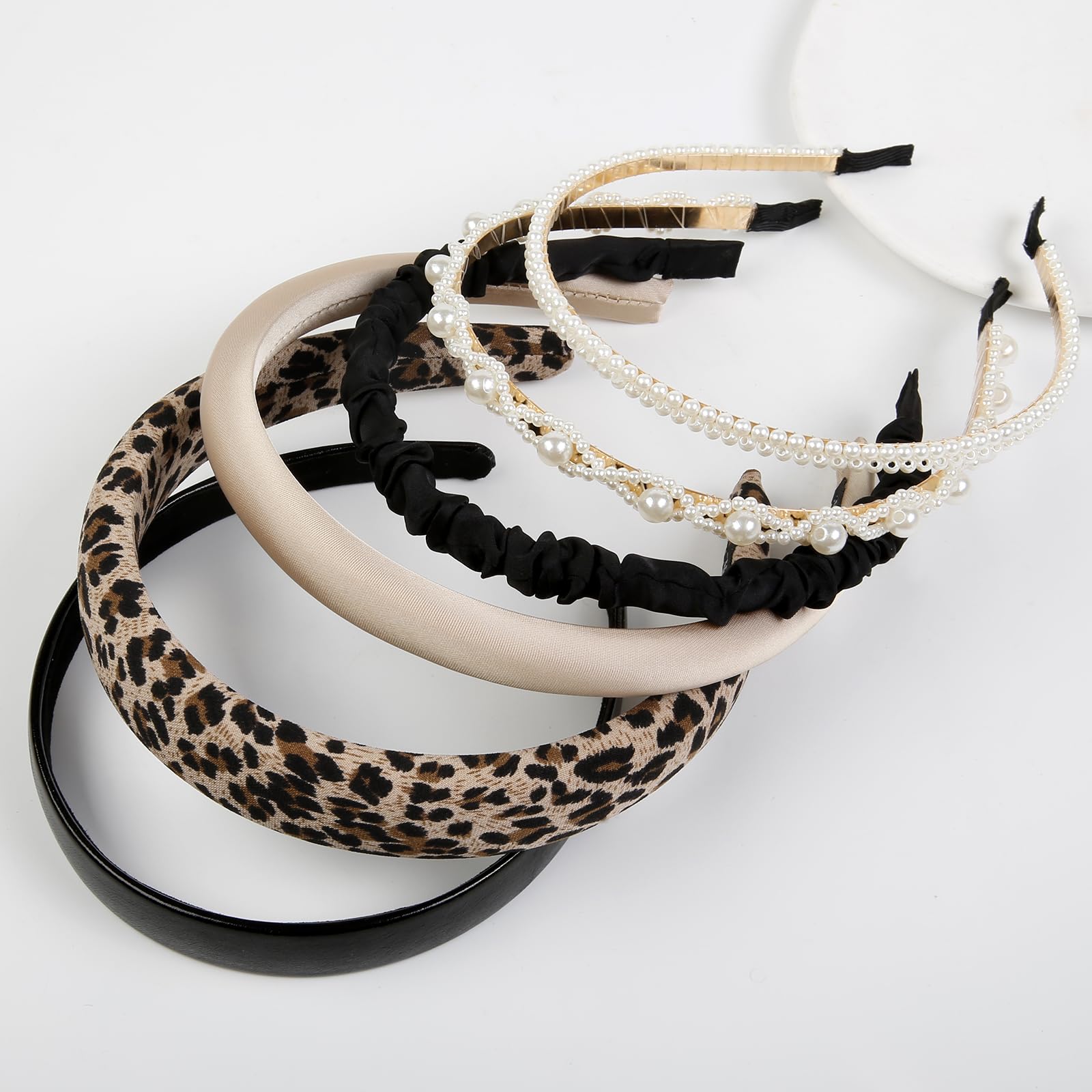 WOVOWOVO pleated headband introduces subtle texture to looks.
