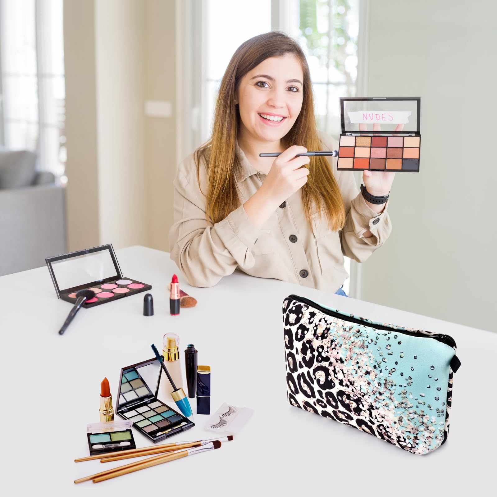 Wteehn compact toiletry bag fits lipstick, sunscreen, cards for travel.