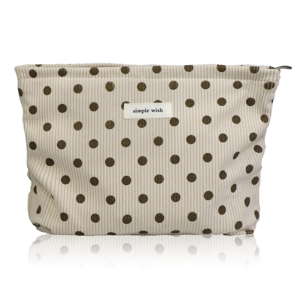 Wudygirl corduroy makeup bag beige polka dot close-up showing soft exterior for everyday use.